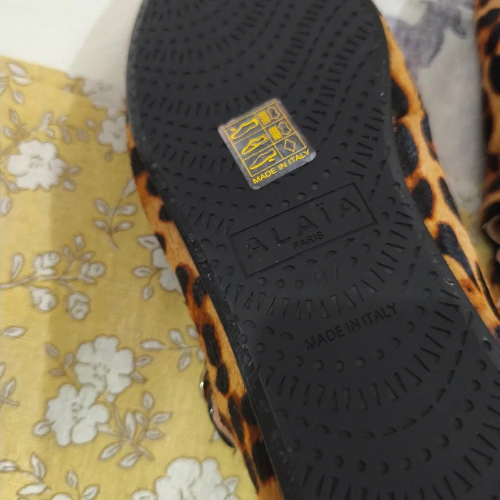 Alaia Leopard-Print Mary Jane Flats in Brown and Black